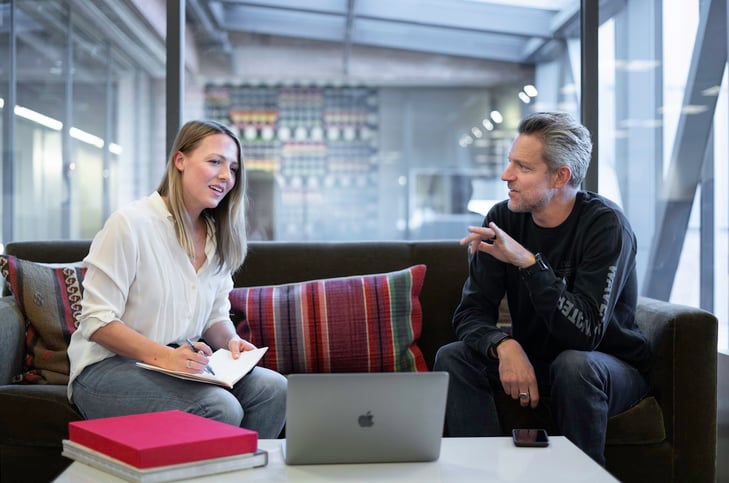 A woman and a man at the meeting