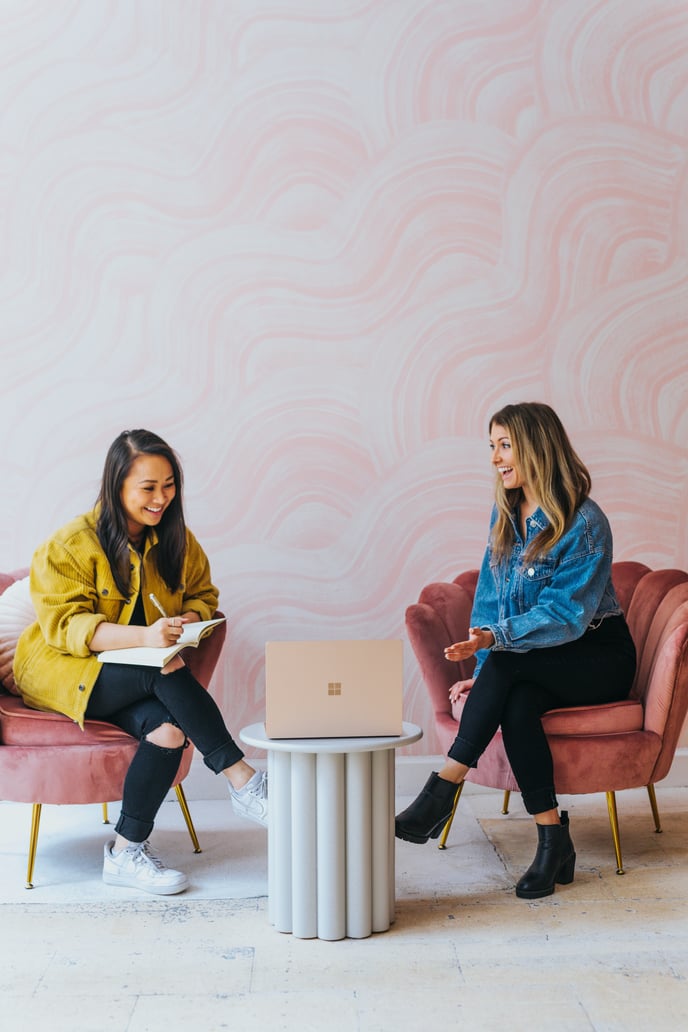 Two female coworkers having a meeting