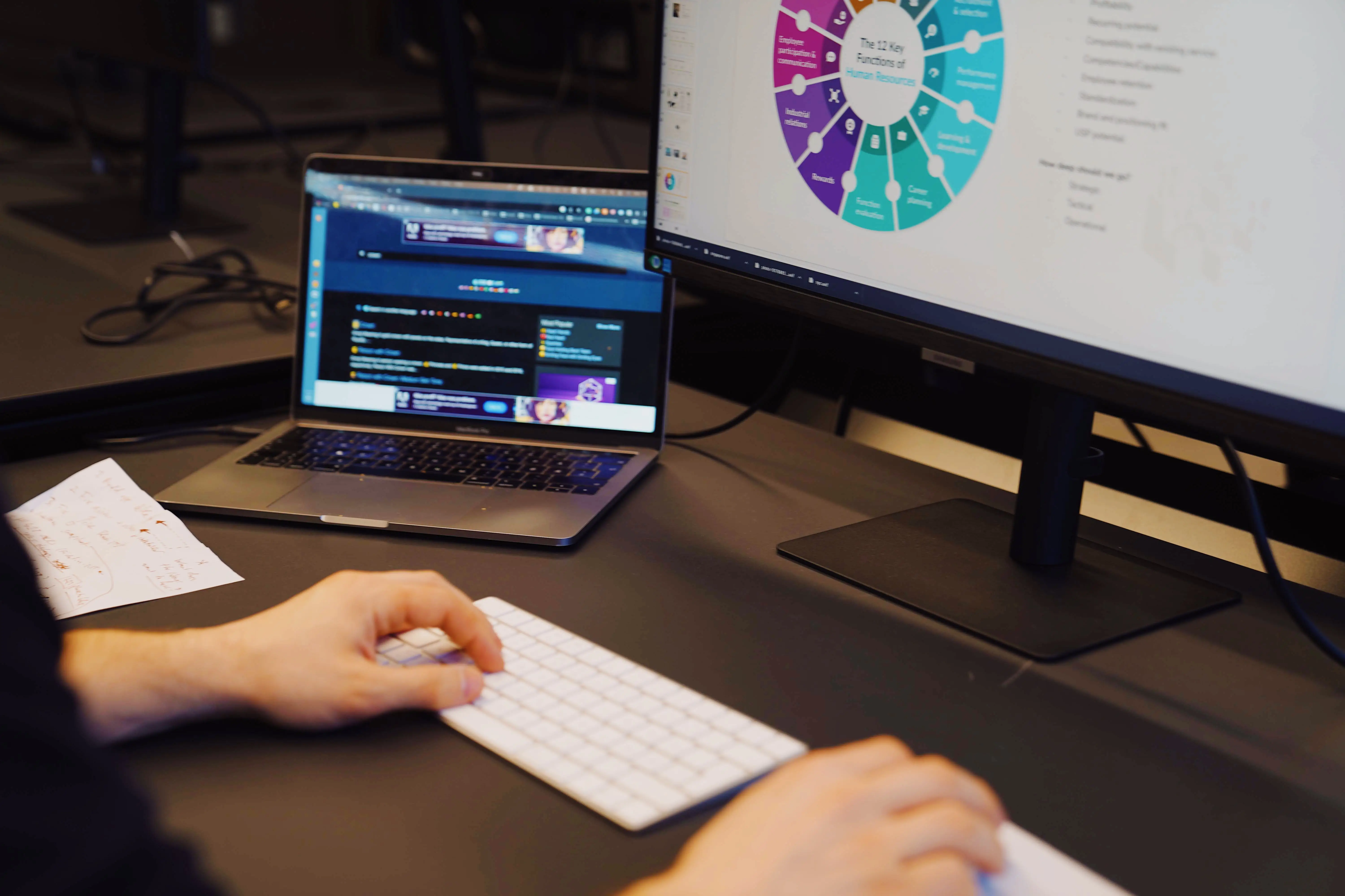 person working on desktop monitor