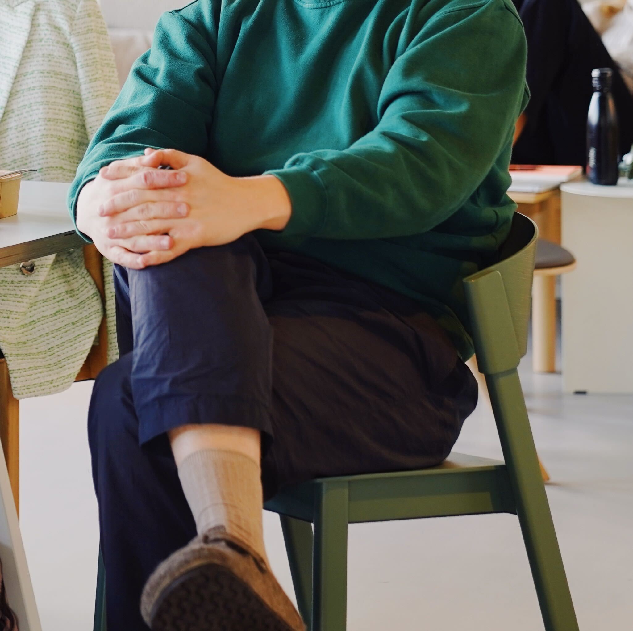 Person sitting on chair