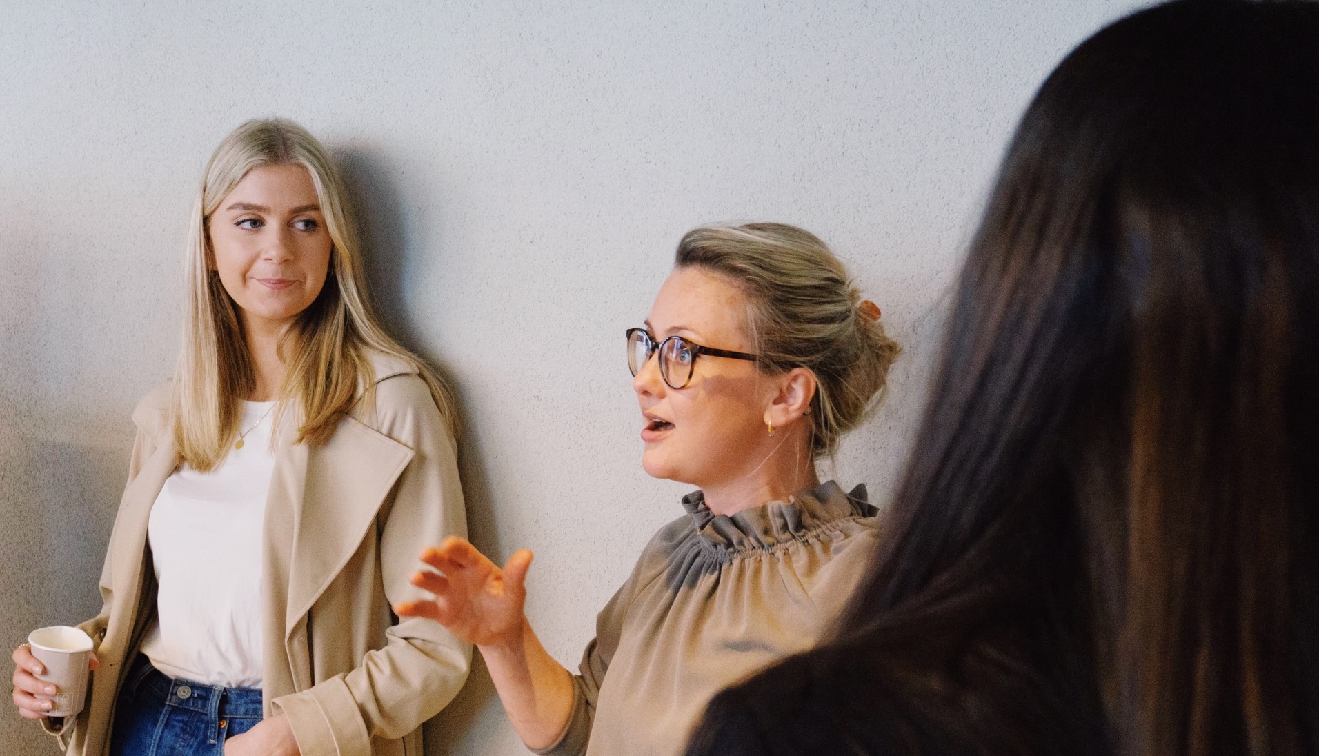 Two women at the company meeting