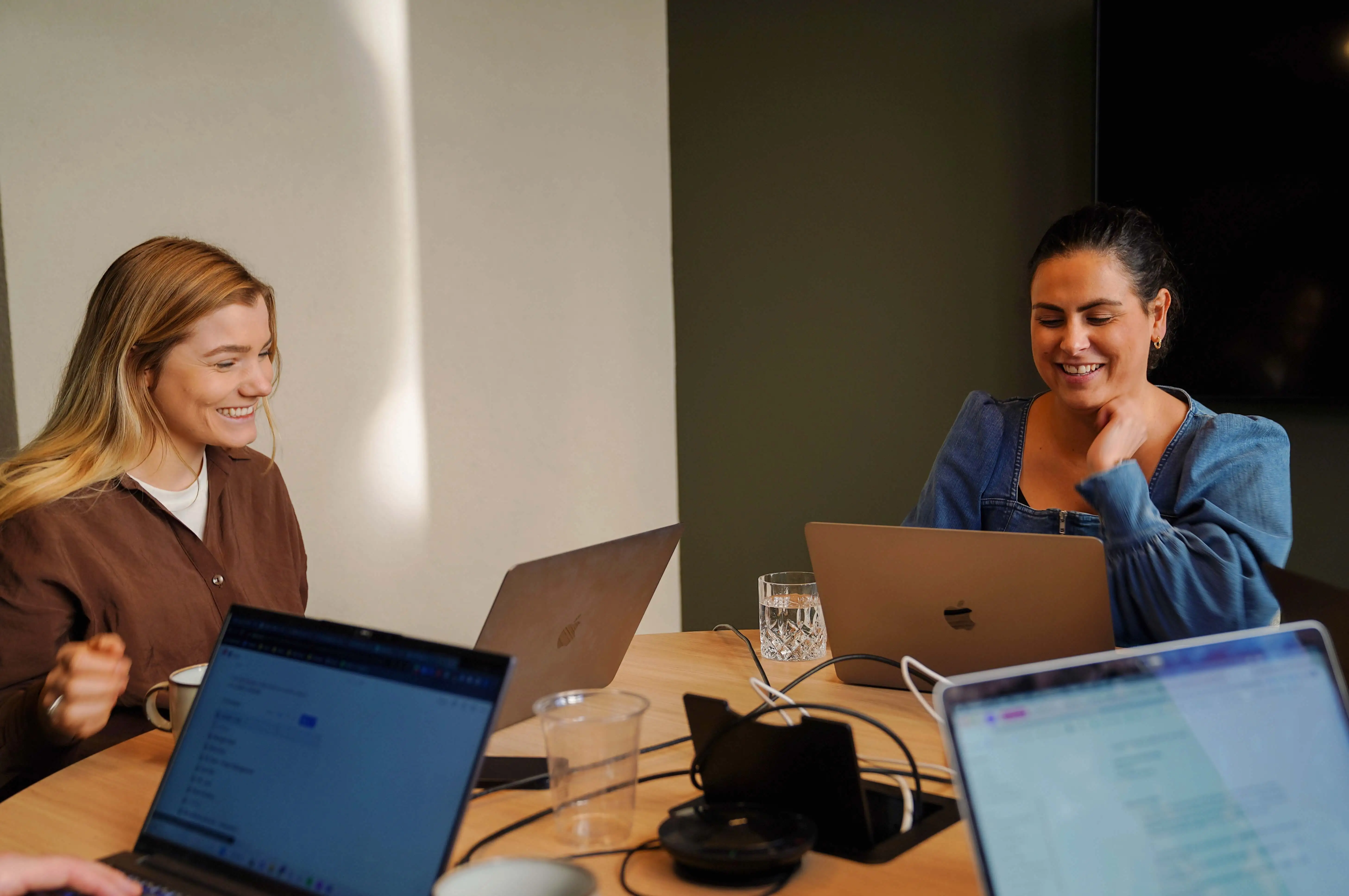 Two people working at a desk