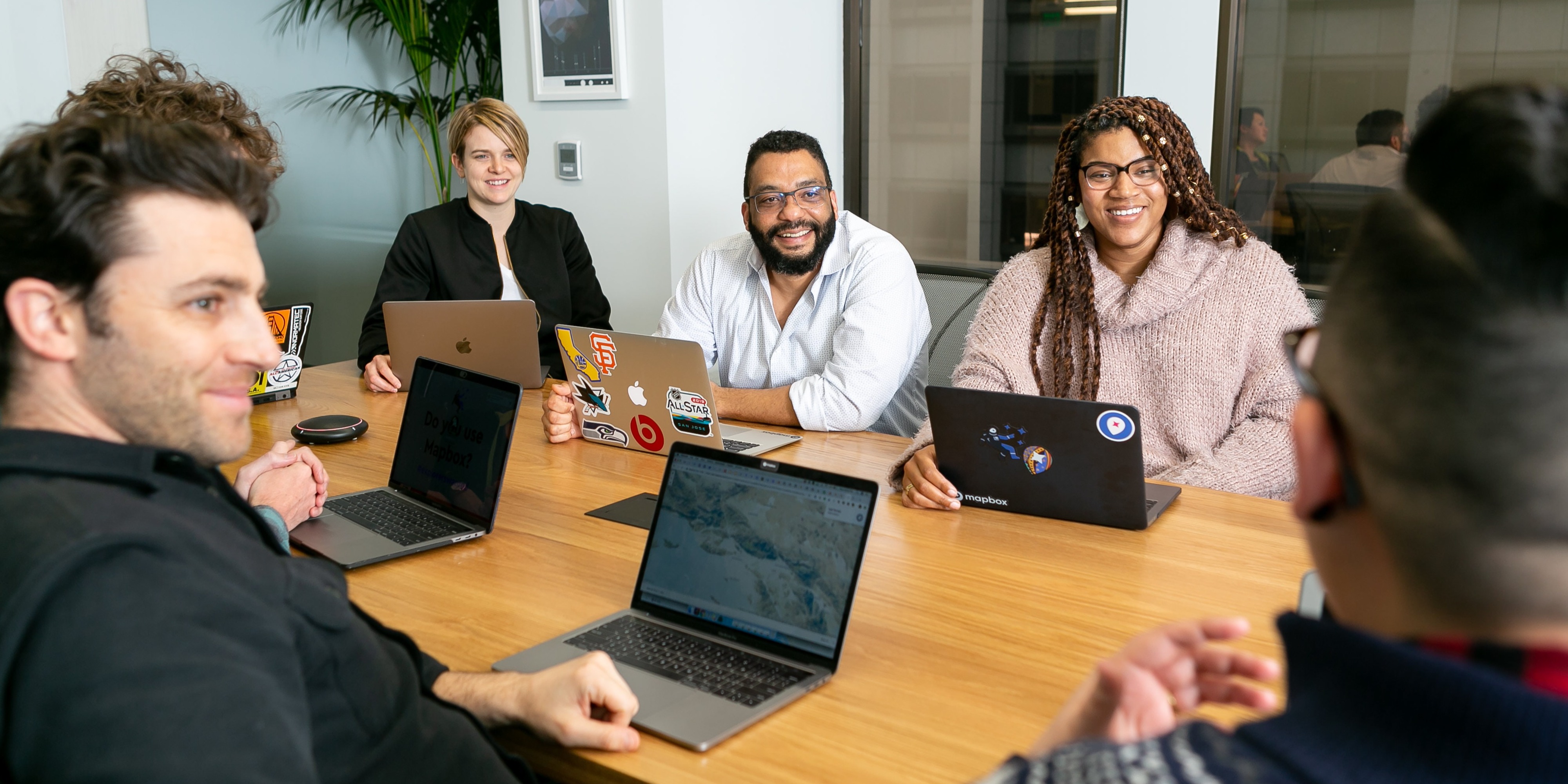 Smiling team at the desk